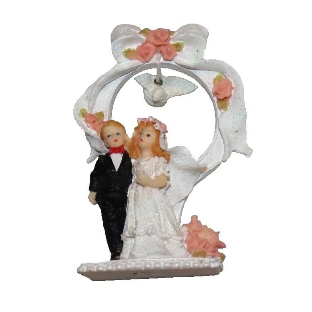 vintage bride & groom wedding cake topper with dove & ring in back